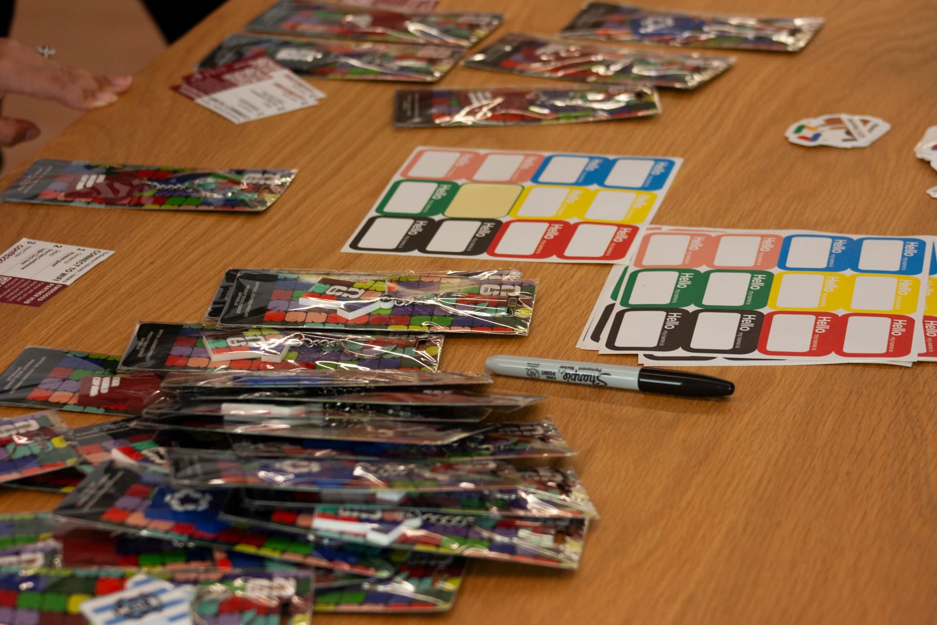 Name tags and swag laid out at a GDG Toronto event